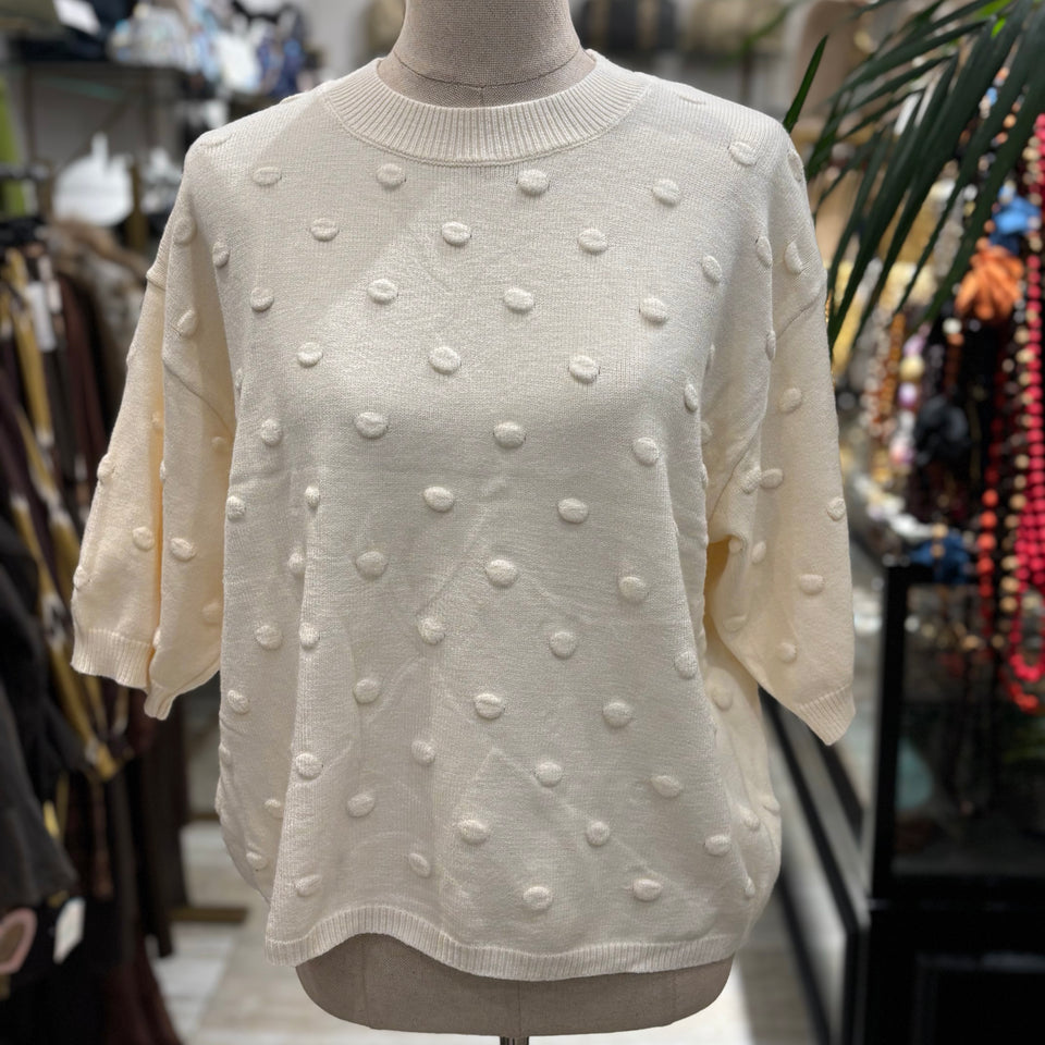 JERSEY CON TOPO EN RELIEVE BEIGE