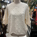 JERSEY CON TOPO EN RELIEVE BEIGE