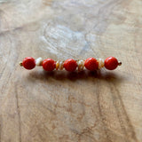 BROCHE CORAL BLANCO BOLAS NARANJAS