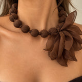 CHOKER FLOR TELA MARRON