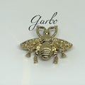 BROCHE REVUELO