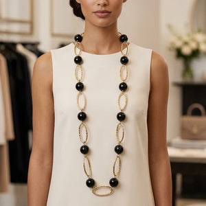 COLLAR LARGHO DORADO BOLAS NEGRAS