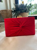 CARTERA DE FIESTA CON NUDO ROJA