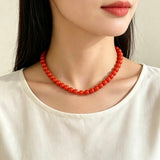 COLLAR BOLA MEDIANA NARANJA