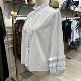 BLUSA BLANCA VOLANTES EN MANGA