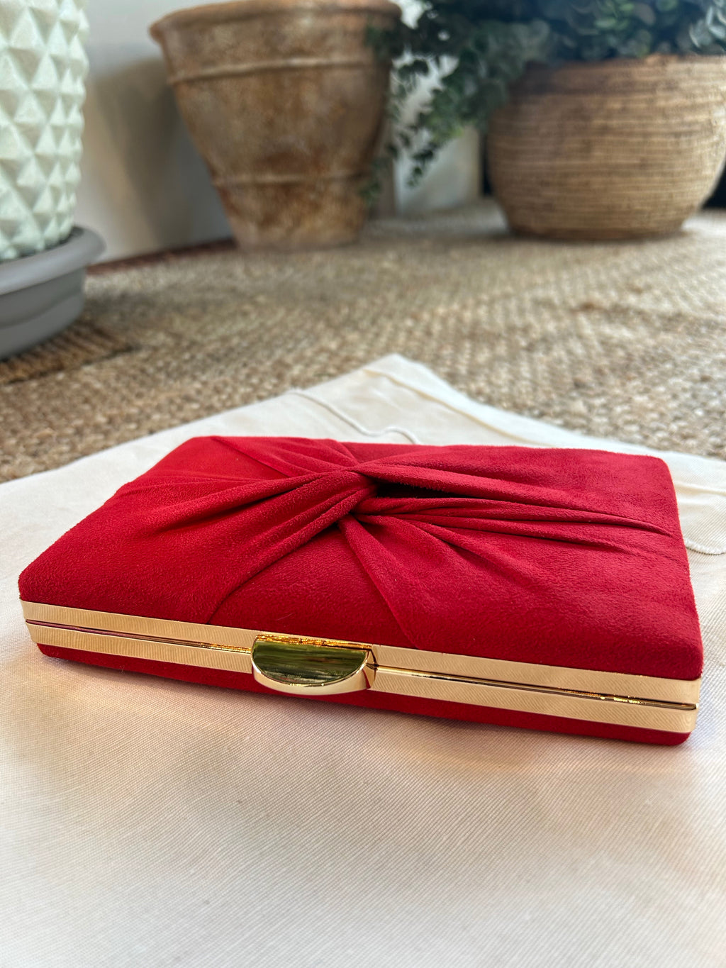 CARTERA DE FIESTA CON NUDO ROJA