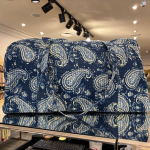 BOLSA ESTAMPADA FONDO AZUL MARINO