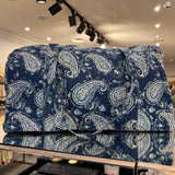 BOLSA ESTAMPADA FONDO AZUL MARINO