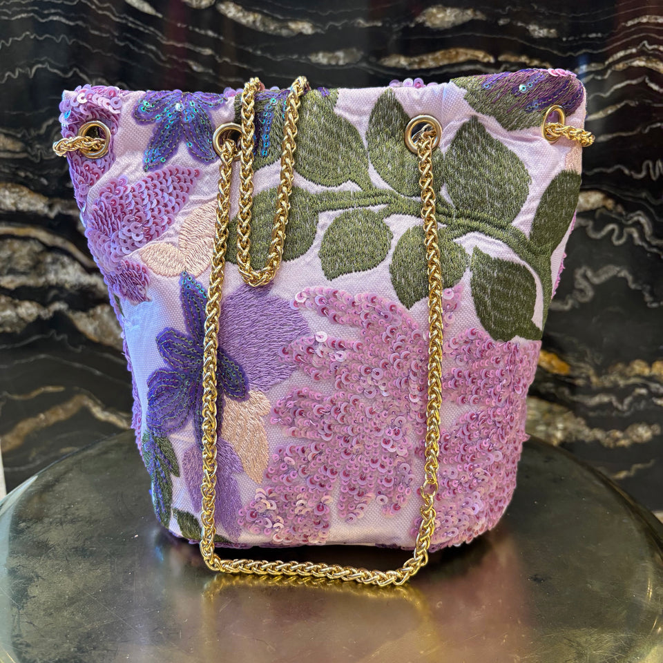 LIMOSNERA ESTAMPADA CON LENTEJUELAS TONOS MALVA
