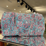 BOLSA ESTAMPADA FONDO TURQUESA