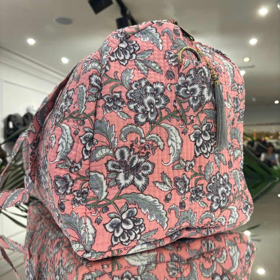 BOLSA ESTAMPADA FONDO ROSA