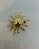 BROCHE SOL