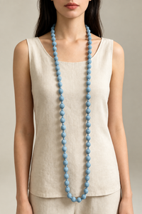COLLAR BOLAS TELA CELESTE