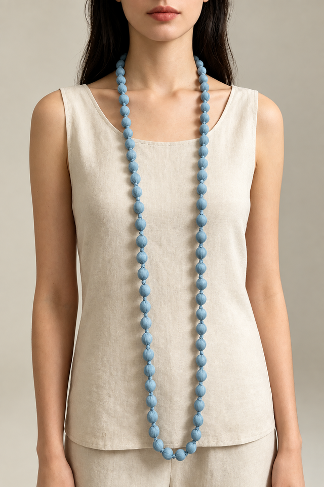 COLLAR BOLAS TELA CELESTE