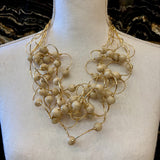 COLLAR BOLAS BEIGE