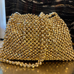 BOLSO DE FIESTA DORADO