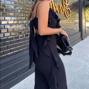 MONO CON VOLANTES ATADO A LA ESPALDA NEGRO