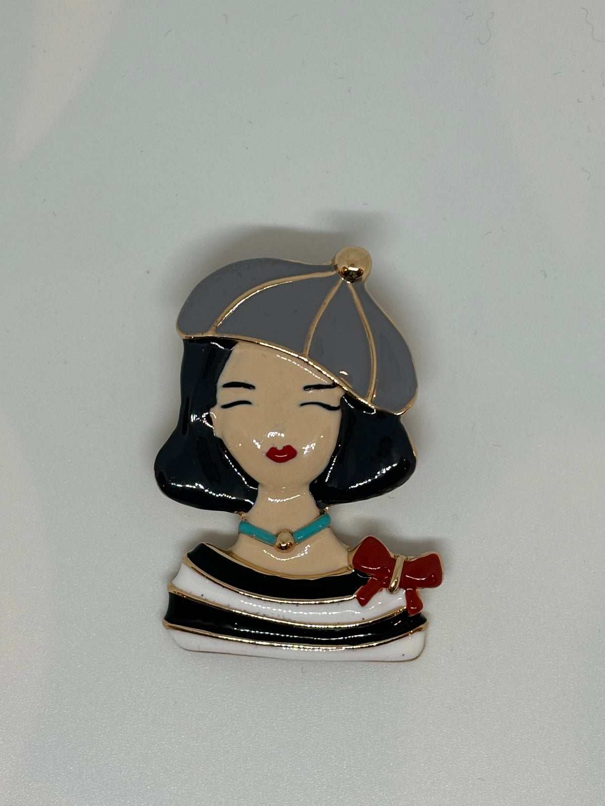 BROCHE MUJER BOINA GRIS
