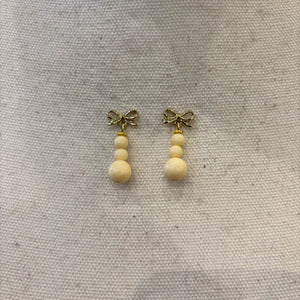 PENDIENTE DE HUESO YLAZO