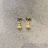 PENDIENTE DE HUESO YLAZO