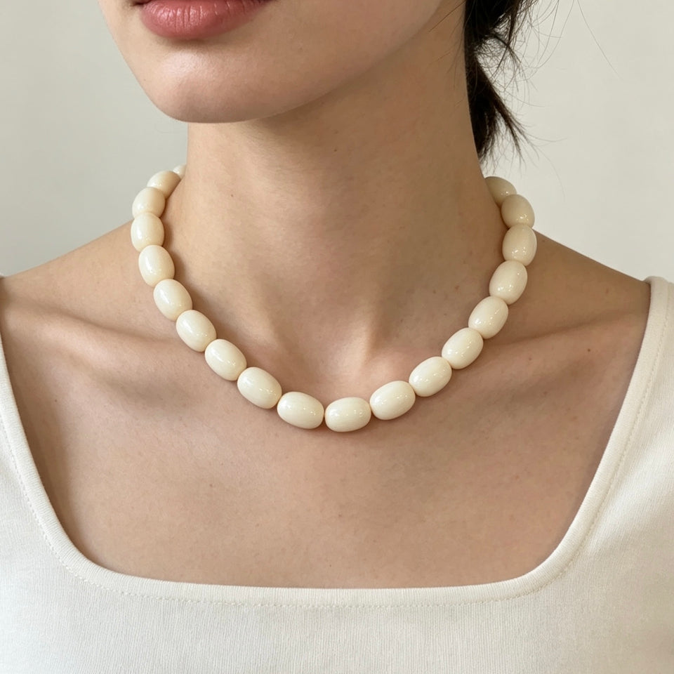 COLLAR HUESO BOLA OVALADA GRANDE