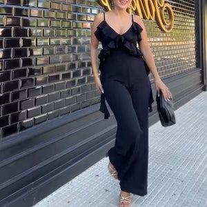 MONO CON VOLANTES ATADO A LA ESPALDA NEGRO