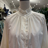 CAMISA BEIGE VOLANTES MANGA