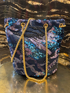 LIMOSNERA ESTAMPADA DE LENTEJUELAS TONOS AZULES
