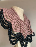 MAXI COLLAR BABERO ROSA/NEGRO