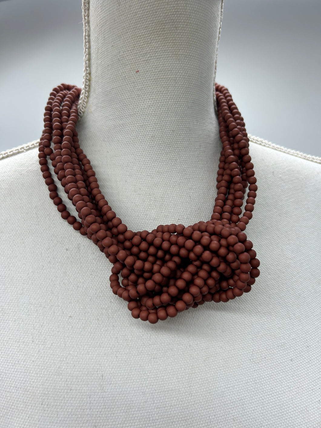 COLLAR NUDO TEJA