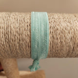 PULSERA DE TELA ELASTICA VERDE AGUA