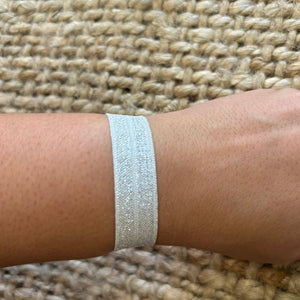 PULSERA DE TELA ELASTICA PLATEADA