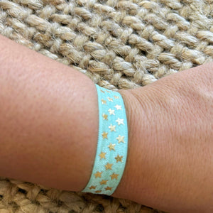 PULSERA DE TELA ELASTICA ESTRELLAS