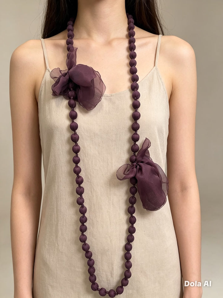 COLLAR  BOLAS TELA Y FLOR BERENJENA