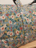 BOLSA MEDIANA ESTAMPADA FONDO GRIS FLORES